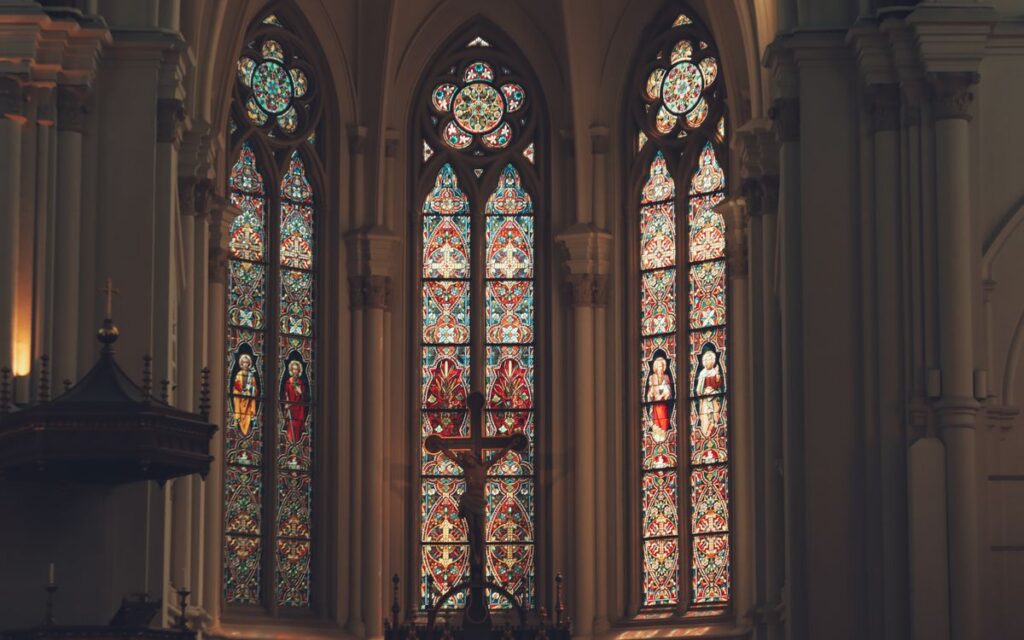 Beautiful stained glass windows in a church interior in Jönköping, Sweden highlighting religious art.